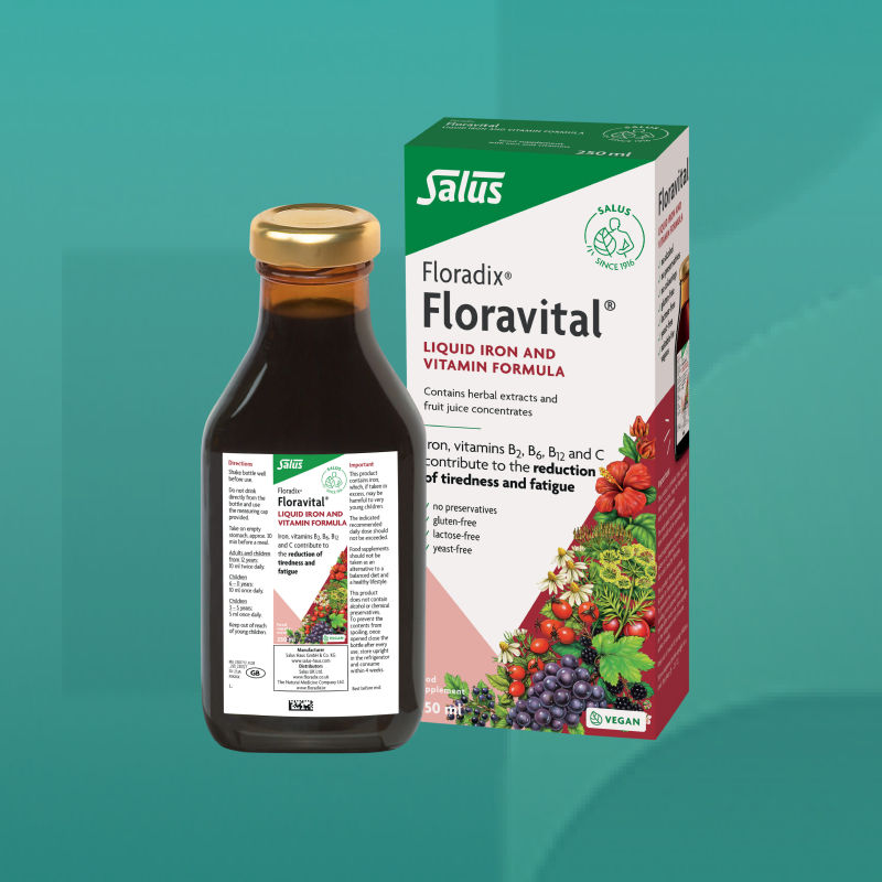 Bottle and box of Floradix Floravital liquid iron and vitamin formula featuring herbal extracts and fruit illustrations a natural energy booster available from Star Pharmacy UK.