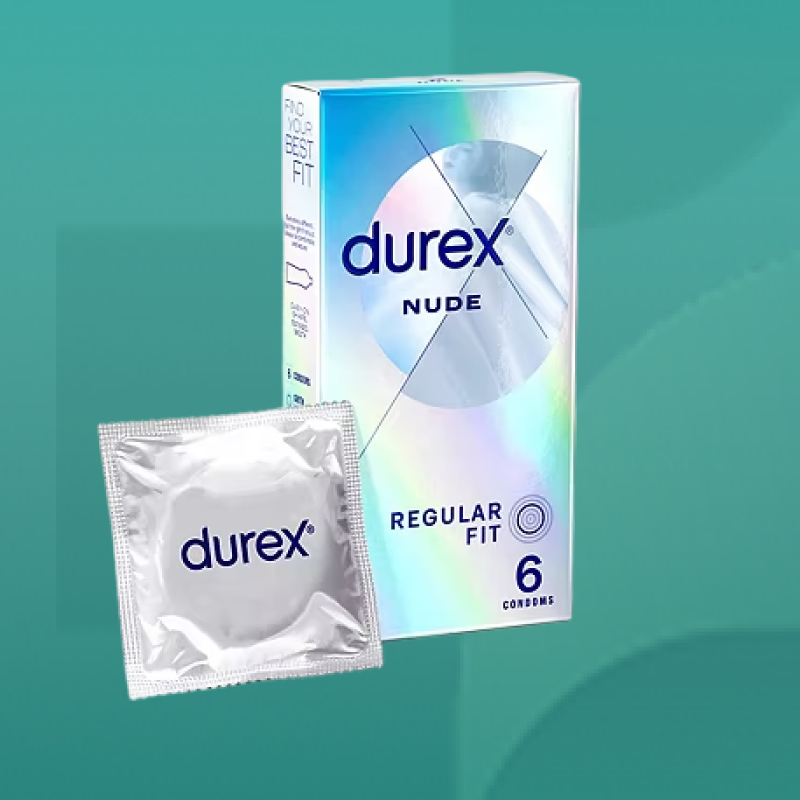 Durex Nude Regular Fit Condoms six pack in silver holographic box with a single foil packet shown designed for natural feel and comfort available at Star Pharmacy UK.