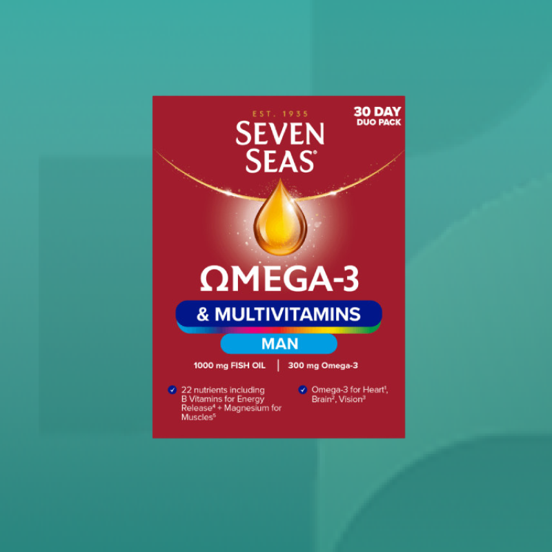 Close up of Seven Seas Omega 3 and Multivitamins for Men 30 day duo pack showing bright red packaging with golden oil drop design available at Star Pharmacy UK.